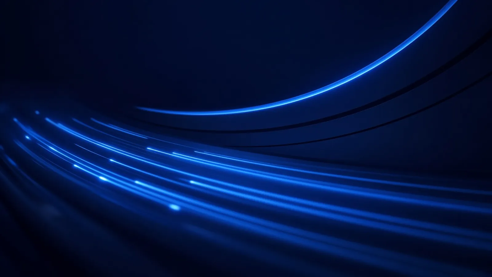 Streaks of electric blue light racing along a curved dark track with motion blur, suggesting a fast loading website